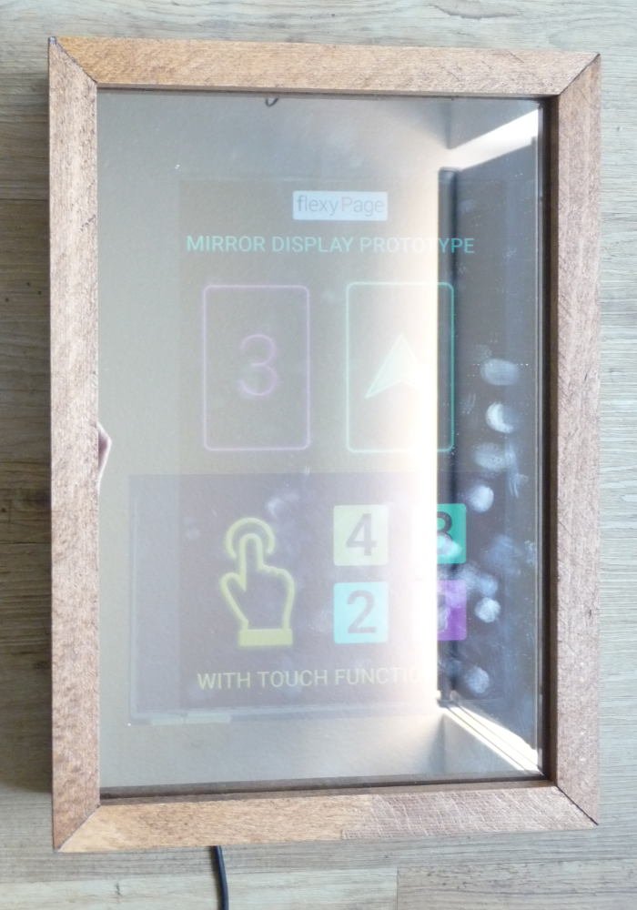 Mirror touch display for Lifts